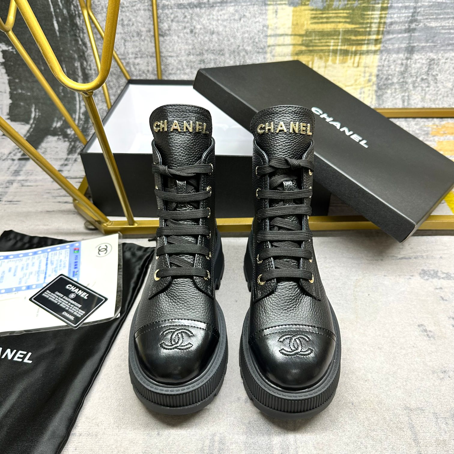 Chanel black leather boots