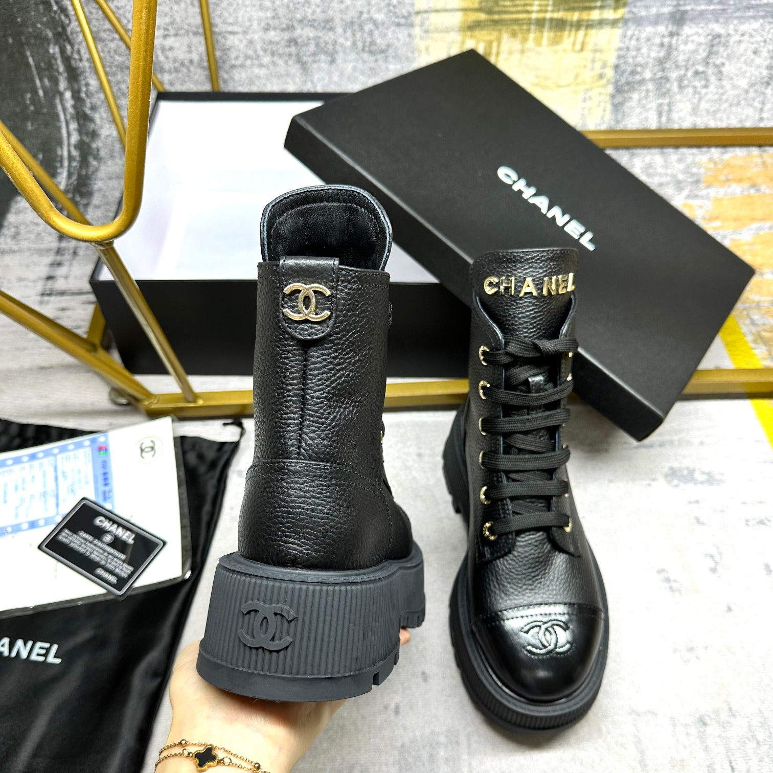 Chanel black leather boots