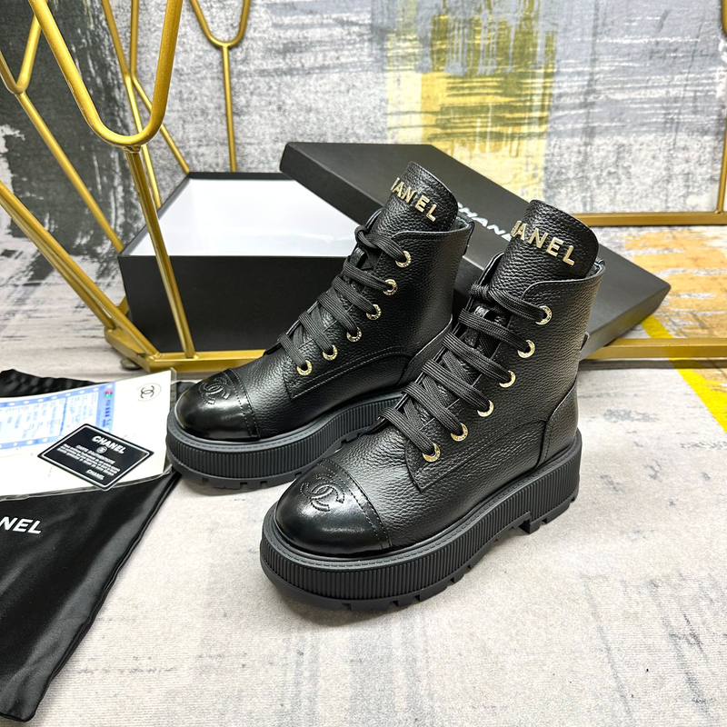 Chanel black leather boots